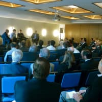 <p>Dozens of businesspeople listen to entrepreneurs and Greenwich natives Tyler and Cameron Winklevoss at an invite-only lecture Thursday in town.</p>