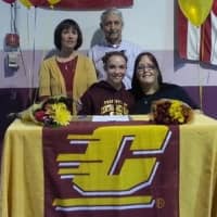 <p>Caroline Fitzpatrick, front row, left, was joined by her parents and Arena Gymnastics coach Laurie Defrancesco when she signed her letter of intent to attend Central Michigan earlier this year.</p>