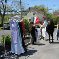 <p>Excited shoppers perused what was left of the dresses in Eastchester after less than an hour.</p>