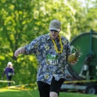 <p>Participants in the Pineapple Classic compete for speed and for the best costume</p>