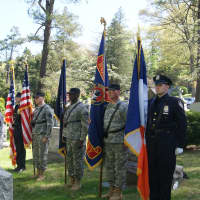 <p>New York Guard Soldiers, Staff Sgt. Augustin L. DePalma, Staff Sergeant Louis DiGiannantonio, Specialist Carson W. Thompson, and Private Robert L. Freeman flanked by New York DEP Police officers, form a color guard during a memorial ceremony.</p>