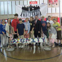 <p>Rye Middle School students gather in the gym for a day of activities celebrating dignity, respect and diversity.</p>