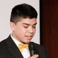 <p>Miguel Garcia, 15, of Ossining spoke about his experiences performing in Random Farms shows, which were made possible with the help of tuition scholarships.</p>