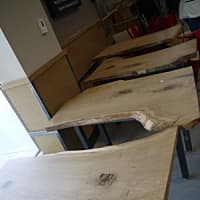 <p>These four tables are made from a sapling of the Danbury Charter Oak.</p>