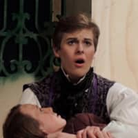 <p>Wilton High School student actors Stephen Jones, who plays Marius, and Caitlin Witty, as Eponine, practice a scene from &quot;Les Miserables.&quot;</p>