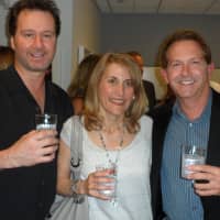 <p>Robert Kaufman, left, Jami Patterson, center and Chris Titus attended the grand opening.</p>