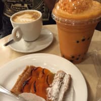 <p>Apricot tart, Thai bubble tea and a macchiato at Sook Pastry in Ridgewood.</p>