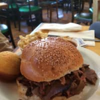 <p>Beef brisket sandwich at Holy Smoke in Mahopac.</p>