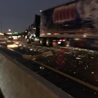 <p>Debris was strewn across both sides of the highway.</p>