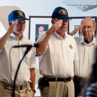 <p>Veterans salute during the May 30 Memorial Day tribute in Pleasantville.</p>