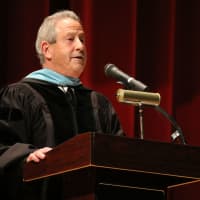 <p>Dr. George Stone, the schools superintendent, addresses the graduating class.</p>