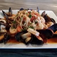 <p>Piccolo Italian Gourmet&#x27;s Linguini with Mussels and Calamari.</p>
