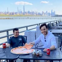 <p>Michael Ghinelli, 21 (R) and Hadi Parhizkaran, 20 (L), new owners of Pizza Club in Edgewater</p>