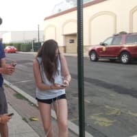 <p>Groups of Suffern teens on Lafayette Avenue duke it out to capture their next Pokémon.</p>