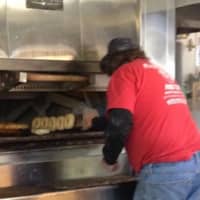 <p>The bagels go in the oven at Plaza Bagel &amp; Deli in Clifton.</p>