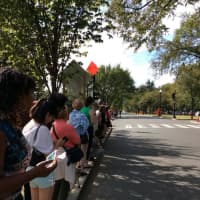 <p>The crowd to see the Pope at the Capitol was estimated at 50,000 people. At the Martin Luther King Jr. Memorial, about 50 people wait for his motorcade to go past. </p>