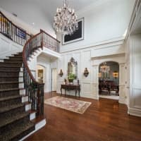 <p>An opulent foyer greets visitors to the home at 5 Pritchard Lane in Westport.</p>