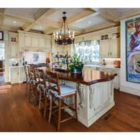 <p>The kitchen at 5 Pritchard Lane in Westport features an oversized island and the best in modern appliances.</p>