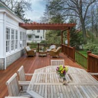 <p>With a 700 sq. ft. deck, the yard is perfect for entertaining guests.</p>