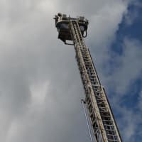 <p>A fire truck extends its ladder for Ridgefield Safety Day. </p>