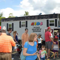 <p>Kids check out the Fire Safety House at Ridgefield Safety Day. </p>