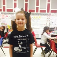 <p>An Elmwood Park girl wears black and white for to support Rare is Beautiful.</p>