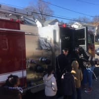 <p>Students at Tracey School get an up close look at a fire truck.</p>