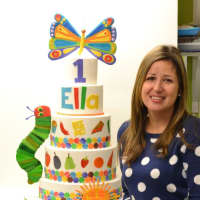 <p>Renata Papadopoulos of Lovely Cakes displays one of her creations.</p>
