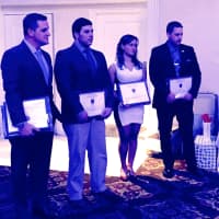 <p>Left to right: Police Chief John Russo, Lt. Mark Amatucci, Officer Kathy Calienni and Sgt. Craig Capoano received commendations.</p>