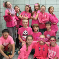 <p>Sixth-graders from the Ridgewood school pose in their pink during Pink Out.</p>