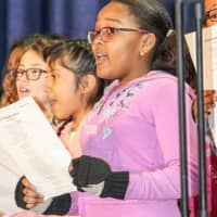 <p>Students at  RJ Bailey School sing &quot;Happy Birthday&quot; and &quot;The Greatest Love of All&quot; as part of a MLK assembly.</p>