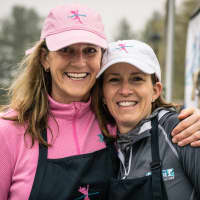 <p>Megan Searfoss, left, the creator of Run Like A Mother, and and race director Deb Povinelli  meet at Sunday&#x27;s race. Both women live in Ridgefield.</p>