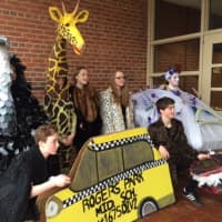 <p>Members of the Rogers Park Middle School&#x27;s Odyssey of the Mind team in the costumes they wore during the World Finals in Iowa.</p>