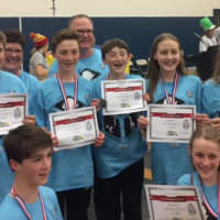 <p>Members of the Rogers Park Middle School team, made up of students from several Danbury schools, show off their certificates after qualifying to participate in the Odyssey of the Mind&#x27;s World Finals last month in Iowa.</p>