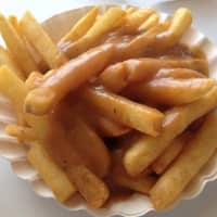 <p>The fluffy, yet crispy, gravy-soaked fries at Rutt&#x27;s Hut in Clifton go well with their famous &quot;rippers,&quot; hot dogs deep fried until their casings split and crack.</p>