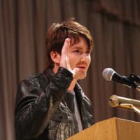 <p>Ryan Caraway thanks the crowd at the Nordic International Film Festival for his &quot;Best Actor&quot; award.</p>
