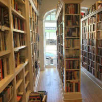 <p>Floor to ceiling and wall to wall —books are the name of the game at Arcade Books in Rye. </p>