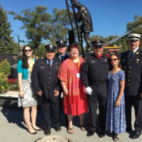 <p>Stamford firefighters with Saunders family at the IAFF memorial in Colorado Springs, Colo.</p>
