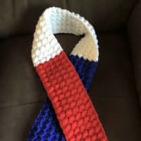 <p>A scarf made by Karen Mello of Bethel helped comfort thousands of residents of France in the wake of attacks by Islamic terrorists.</p>
