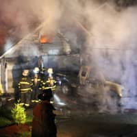 <p>The truck and garage were destroyed.</p>