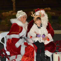 <p>Santa and Mrs. Claus meet with kids at the Stony Hill tree lighting. </p>