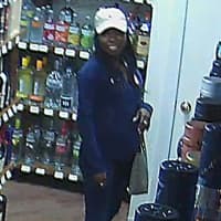<p>One of the suspects in the theft of multiple bottles of liquor from a store in Ridgefield.</p>