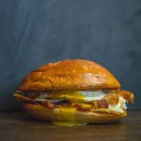 <p>The classic bacon, egg and cheese that started it all. The Pig—bacon, two eggs and American cheese.</p>