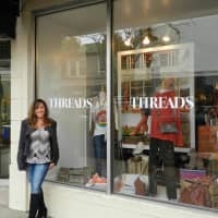 <p>Upper Saddle River resident Heidi Skelton outside her two-year-old store, Threads, in Westwood.</p>