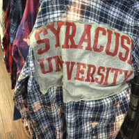 <p>Customized college shirts sell well at Threads in Westwood.</p>