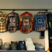 <p>College shirts at Threads in Westwood.</p>