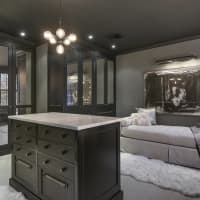 <p>The master bedroom features spacious closets and a unique feel.</p>