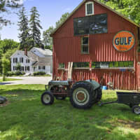 <p>The home includes a two-story barn with an attached guest suite.</p>