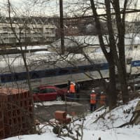<p>A Danbury-bound train slammed into a car on the tracks at a private grade crossing in Central Norwalk on Tuesday afternoon.</p>