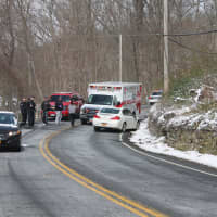 <p>Fire and EMS tend to victim and coordinate with Carmel Police for road closure and detour while Highway Department sets up for tree removal.</p>